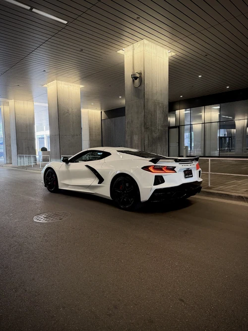 Corvette C8 Stingray - White exterior rear view — Axel Luxury Chicago