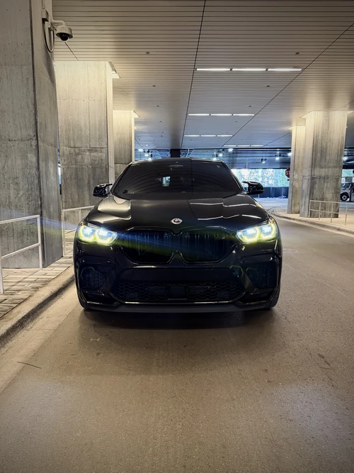 BMW X6M Competition exterior front view — Axel Luxury Chicago