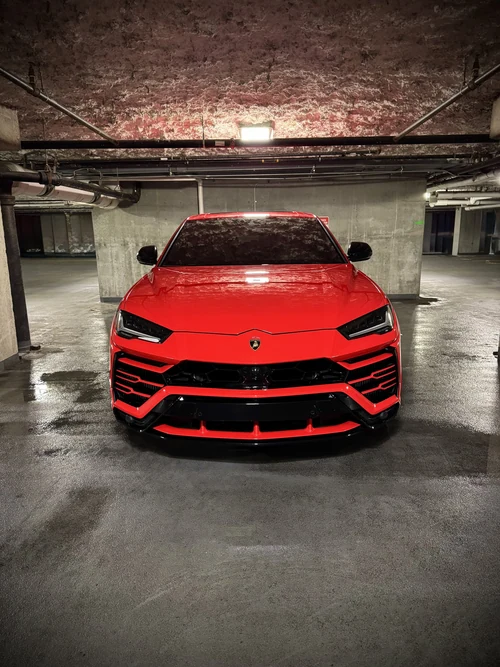 Lamborghini Urus - Red exterior front view — Axel Luxury Chicago