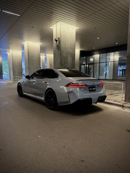 BMW M5 exterior rear 3/4 view — Axel Luxury Chicago
