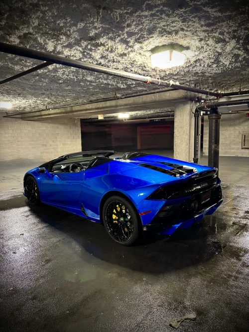 Lamborghini Huracan Evo Spyder exterior rear view — Axel Luxury Chicago