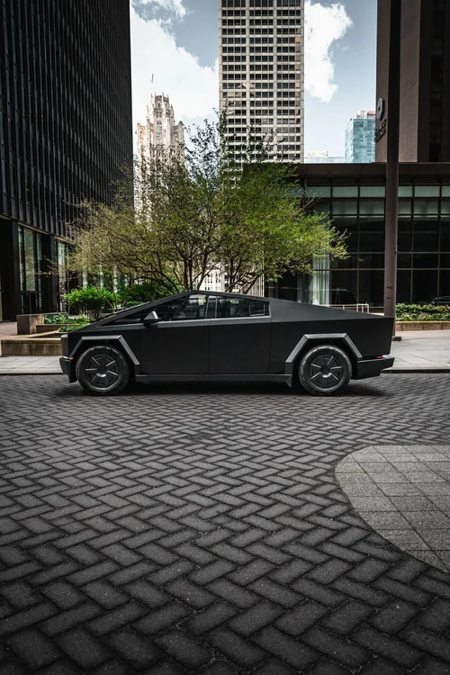 Tesla Cybertruck - Satin Black exterior side view — Axel Luxury Chicago