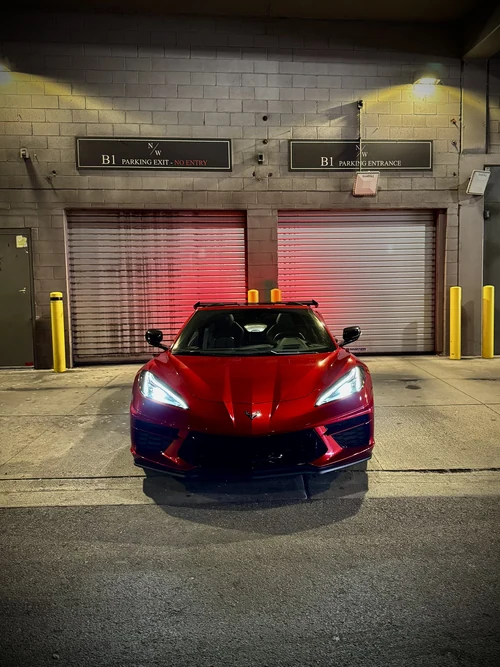 Corvette C8 Stingray - Metallic Red exterior front view — Axel Luxury Chicago