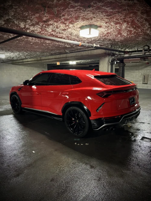 Lamborghini Urus - Red exterior rear view — Axel Luxury Chicago