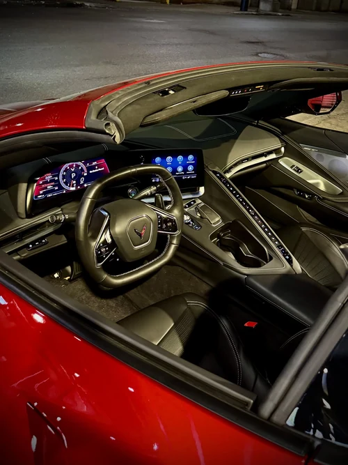 Corvette C8 Stingray - Metallic Red exterior side view — Axel Luxury Chicago