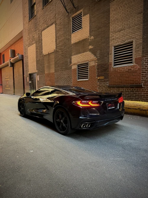 Corvette C8 Stingray - Black exterior rear view — Axel Luxury Chicago