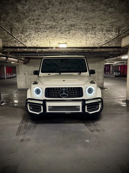 Mercedes-AMG G63 - White exterior front view — Axel Luxury Chicago