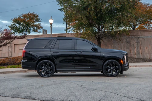 Cadillac Escalade exterior side view — Axel Luxury Chicago