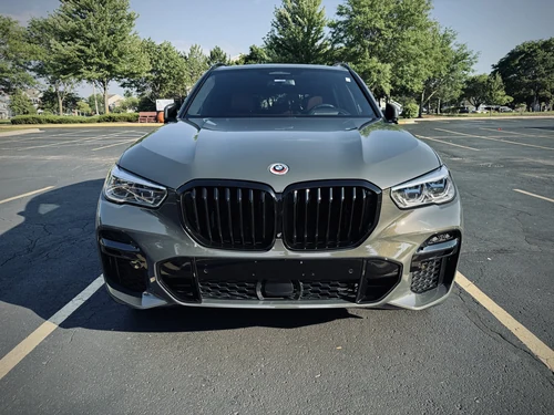 BMW X5 M50i exterior front view — Axel Luxury Chicago