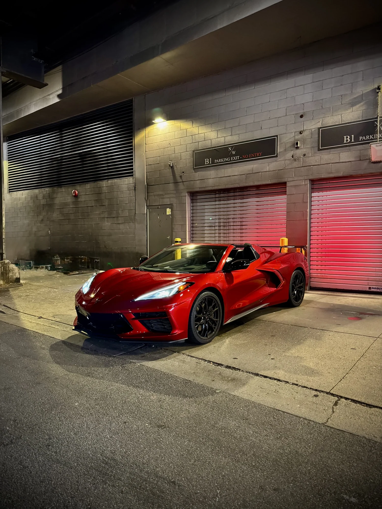 Metallic red Corvette C8 Stingray 3LT Z51 front three-quarter view from Axel Luxury in Chicago